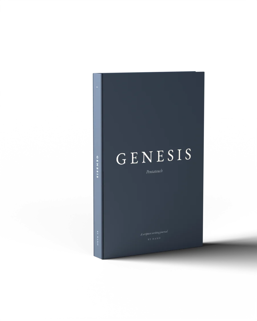 Genesis, volume I of By Hand, standing in its navy dust jacket.